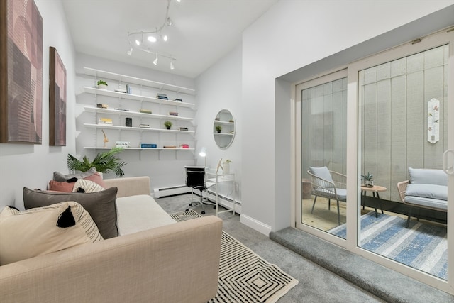 living room with carpet floors and baseboard heating