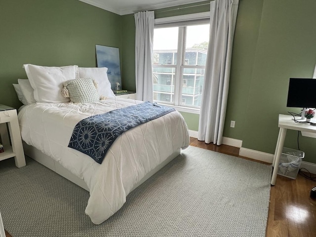 239 Prospect St Unit 241-3, Cambridge, MA 02139 - bedroom featuring wood finished floors and baseboards