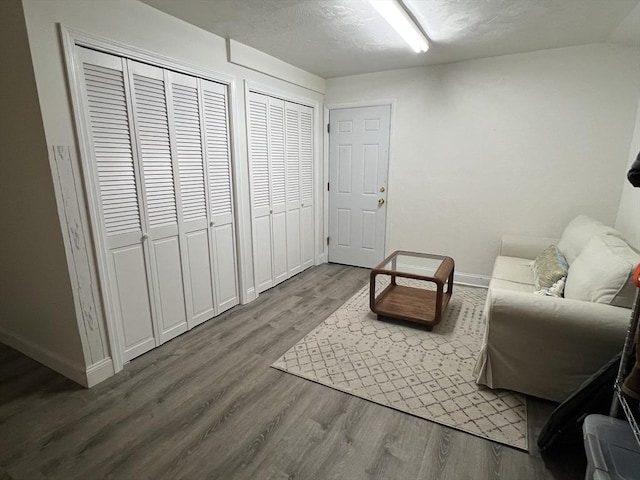 239 Prospect St Unit 241-3, Cambridge, MA 02139 - sitting room with wood finished floors and baseboards