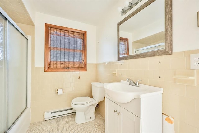 118 Coolidge St, Swansea, MA 02777 - bathroom featuring baseboard heating, tile walls, vanity, tile patterned flooring, and a wainscoted wall