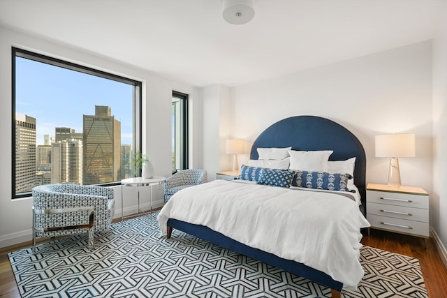 bedroom featuring hardwood / wood-style flooring