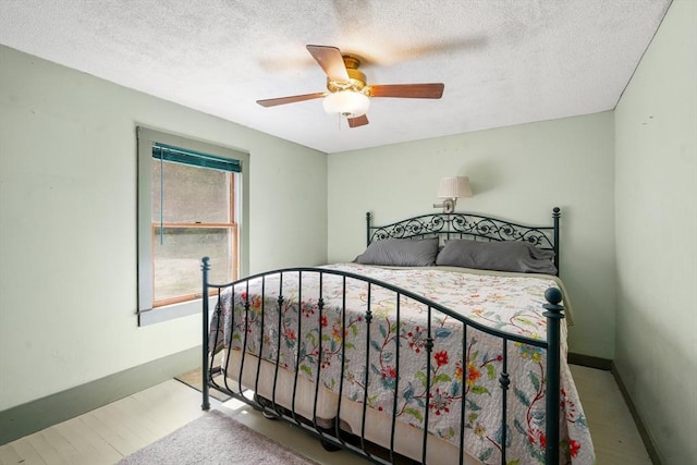 24 Webber Rd, Brookfield, MA 01506 - bedroom featuring a textured ceiling, ceiling fan, and baseboards