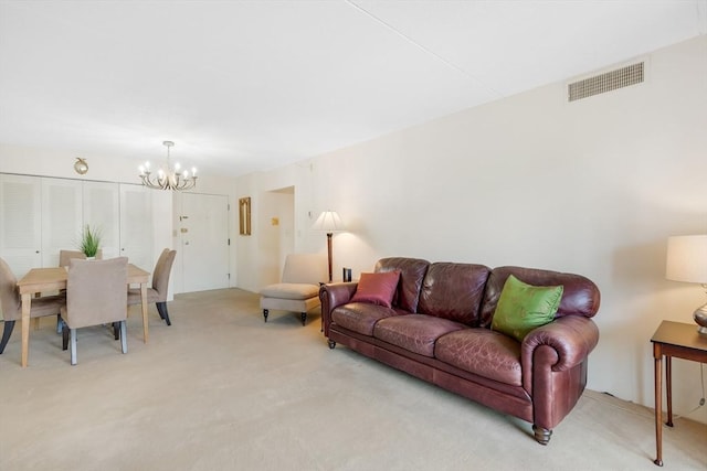 51 Melrose St Unit 5A, Melrose, MA 02176 - living room with light carpet and a chandelier