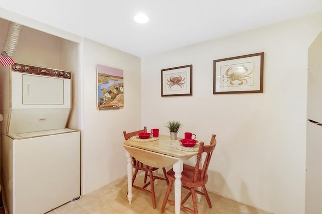 51 Melrose St Unit 5A, Melrose, MA 02176 - dining space with stacked washing machine and dryer and recessed lighting