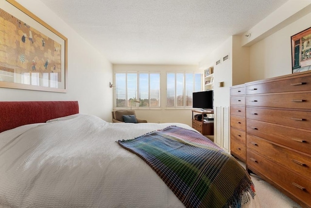 bedroom featuring carpet