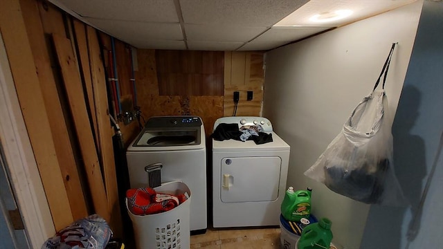 laundry room featuring separate washer and dryer and laundry area