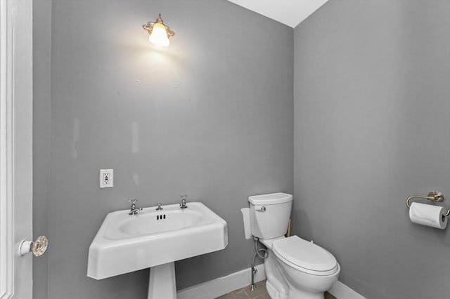 43 Baldwin St, Boston, MA 02129 - half bathroom with toilet and tile patterned flooring