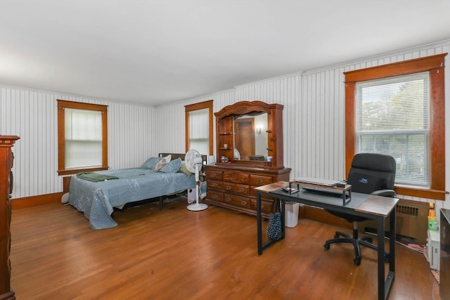 bedroom featuring hardwood / wood-style floors