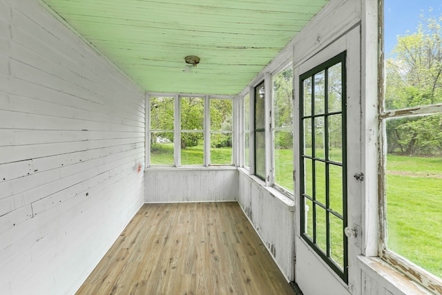 unfurnished sunroom with a healthy amount of sunlight