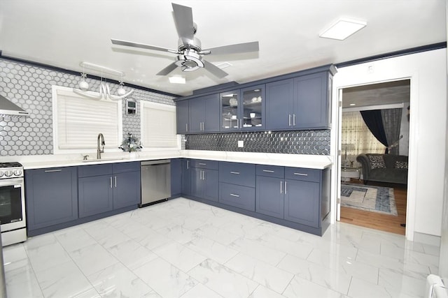 541 Grattan St, Chicopee, MA 01020 - kitchen with stainless steel appliances, light marble finish flooring, ceiling fan, light countertops, and glass insert cabinets