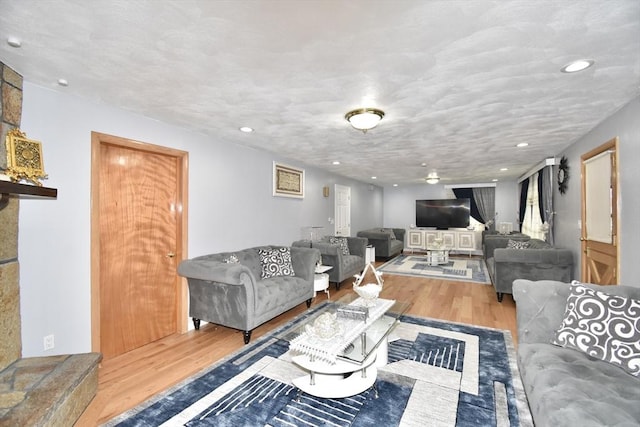 541 Grattan St, Chicopee, MA 01020 - living area featuring wood finished floors and recessed lighting