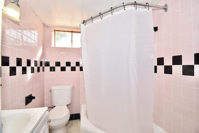 541 Grattan St, Chicopee, MA 01020 - bathroom featuring tile walls, vanity, and shower / bath combination with curtain