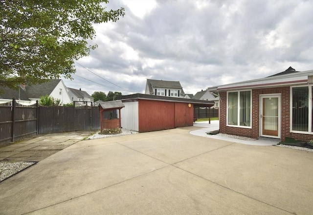 541 Grattan St, Chicopee, MA 01020 - view of patio / terrace with a storage unit