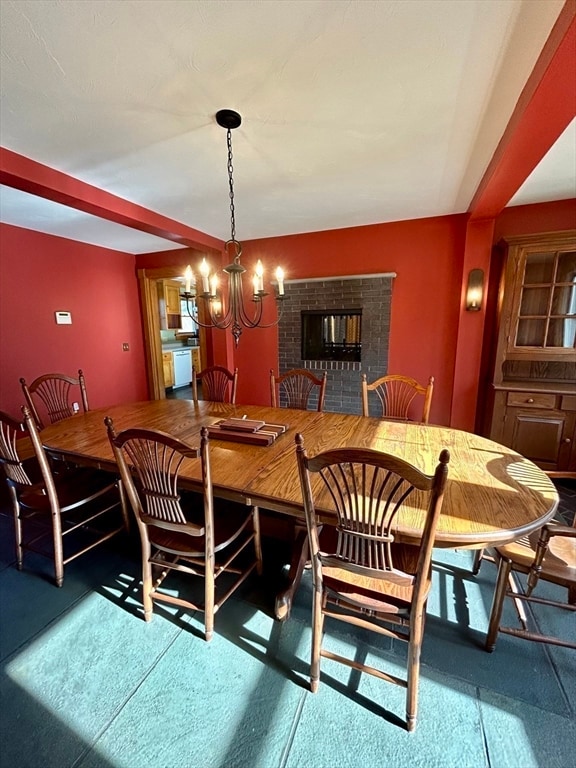 dining area featuring a chandelier