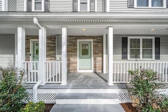 960 Main St Unit C, Woburn, MA 01801 - doorway to property with a porch and stone siding