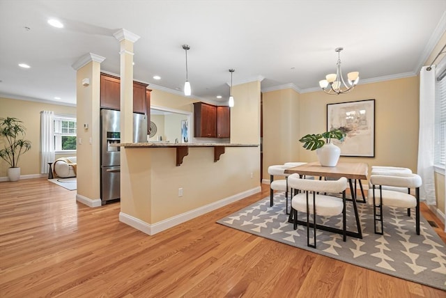 960 Main St Unit C, Woburn, MA 01801 - dining room with light wood-type flooring, baseboards, a chandelier, ornamental molding, and recessed lighting