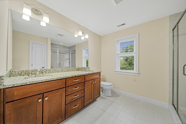 960 Main St Unit C, Woburn, MA 01801 - bathroom with double vanity, baseboards, and a stall shower