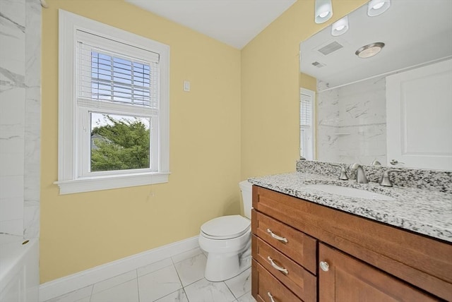 960 Main St Unit C, Woburn, MA 01801 - full bath featuring marble finish floors, vanity, baseboards, and toilet