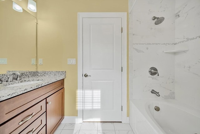 960 Main St Unit C, Woburn, MA 01801 - full bath with marble look tile flooring, vanity, baseboards, and tub / shower combination