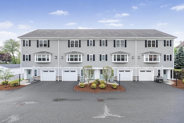 960 Main St Unit C, Woburn, MA 01801 - multi unit property featuring driveway, an attached garage, and central AC unit