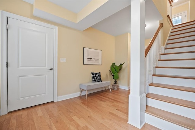 960 Main St Unit C, Woburn, MA 01801 - entryway with light wood-style flooring, stairway, and baseboards