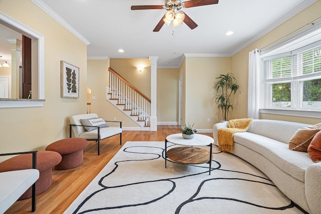960 Main St Unit C, Woburn, MA 01801 - living room with decorative columns, wood finished floors, ceiling fan, crown molding, and recessed lighting
