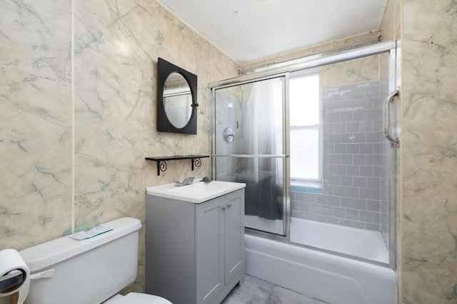 224-232 Caroline, New Bedford, MA 02740 - bathroom with toilet, vanity, shower / bath combination with glass door, and tile walls
