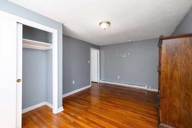 224-232 Caroline, New Bedford, MA 02740 - unfurnished bedroom with baseboard heating, wood finished floors, baseboards, and a closet
