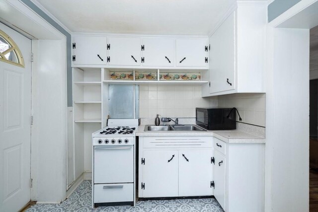 224-232 Caroline, New Bedford, MA 02740 - kitchen with gas range gas stove, open shelves, a sink, black microwave, and light countertops