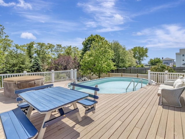 10 Vernon Ave, Hull, MA 02045 - view of swimming pool with a fenced backyard, a deck, a covered hot tub, and outdoor dining space