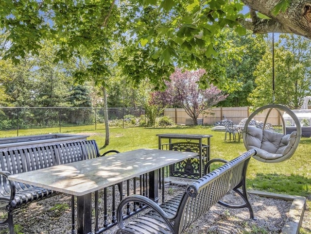 10 Vernon Ave, Hull, MA 02045 - fenced backyard with outdoor dining area