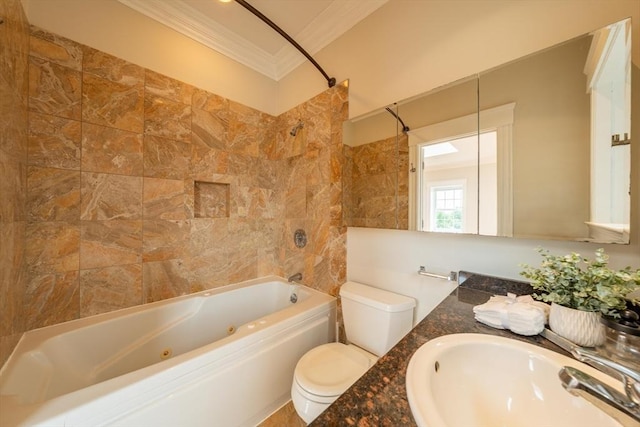 bathroom featuring crown molding, tile walls, a combined bath / shower with jetted tub, toilet, and vanity