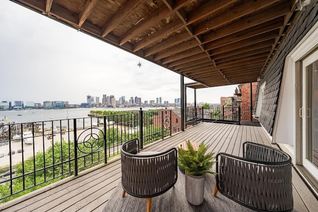 wooden terrace with a city view