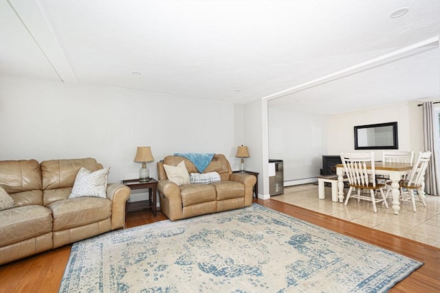 54 Clarke Rd, Sturbridge, MA 01518 - living room with wood finished floors and baseboard heating