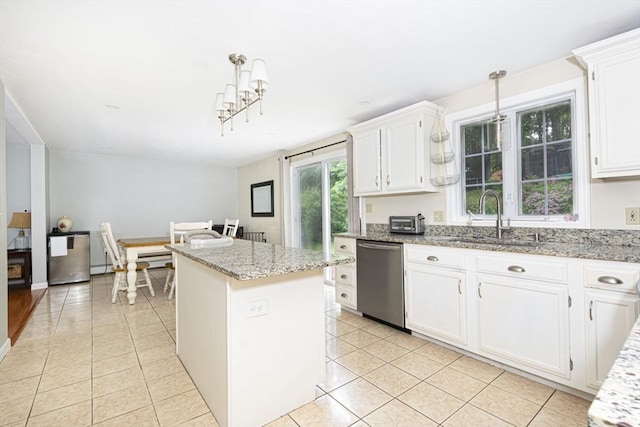 54 Clarke Rd, Sturbridge, MA 01518 - kitchen with dishwasher, light tile patterned floors, white cabinetry, and light stone counters