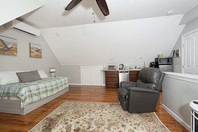 54 Clarke Rd, Sturbridge, MA 01518 - bedroom with a wall unit AC, wood finished floors, lofted ceiling, and ceiling fan