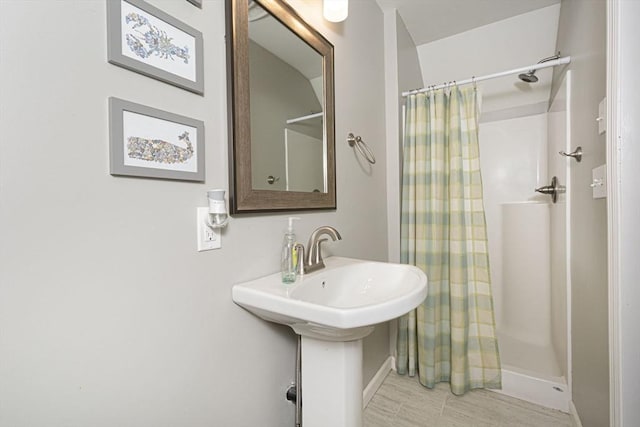54 Clarke Rd, Sturbridge, MA 01518 - bathroom with a shower with curtain and baseboards