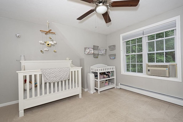 54 Clarke Rd, Sturbridge, MA 01518 - bedroom with a baseboard heating unit, carpet flooring, cooling unit, and a nursery area