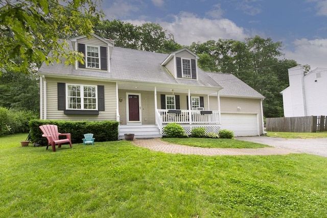 54 Clarke Rd, Sturbridge, MA 01518 - cape cod-style house with a porch, driveway, and an attached garage