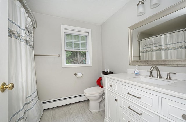 54 Clarke Rd, Sturbridge, MA 01518 - bathroom featuring a baseboard heating unit, vanity, and curtained shower