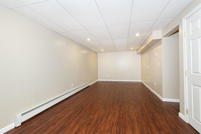 54 Clarke Rd, Sturbridge, MA 01518 - unfurnished room featuring a baseboard heating unit, dark wood-style floors, recessed lighting, and a paneled ceiling