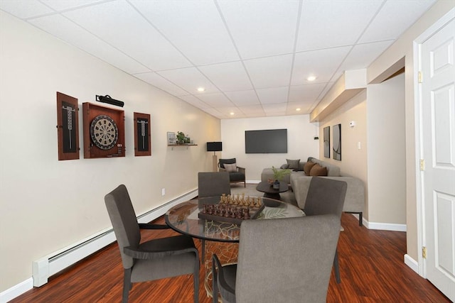 54 Clarke Rd, Sturbridge, MA 01518 - dining space featuring dark wood-type flooring, recessed lighting, electric panel, a paneled ceiling, and baseboard heating