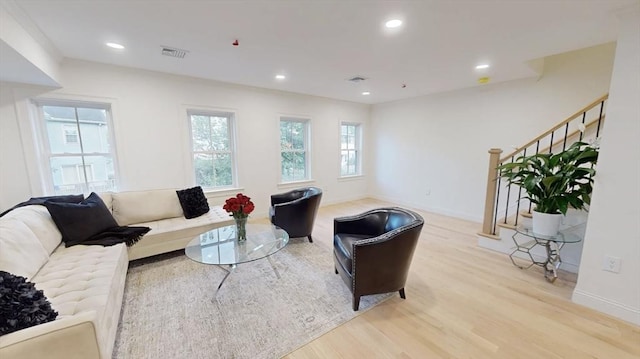 50 N Payne St Unit 5, Quincy, MA 02169 - living room featuring light wood finished floors, stairs, recessed lighting, and baseboards