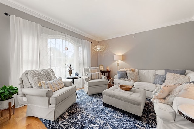 living room featuring crown molding and hardwood / wood-style flooring