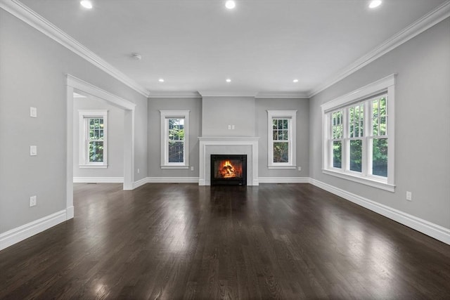 1 Farwell Cir, Newton, MA 02460 - unfurnished living room featuring dark wood-style flooring, recessed lighting, baseboards, a lit fireplace, and crown molding