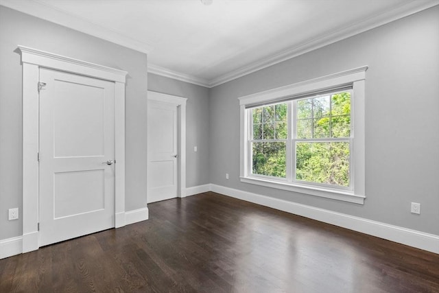 1 Farwell Cir, Newton, MA 02460 - unfurnished bedroom with dark wood-type flooring, baseboards, and crown molding