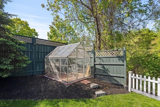 1 Farwell Cir, Newton, MA 02460 - fenced backyard with a greenhouse and an outbuilding
