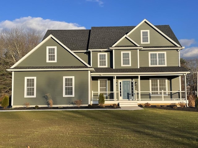 view of front of house featuring a front lawn and a porch