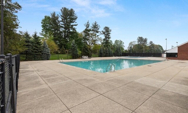 41 Clarke St, Lexington, MA 02421 - community pool with fence and a patio area