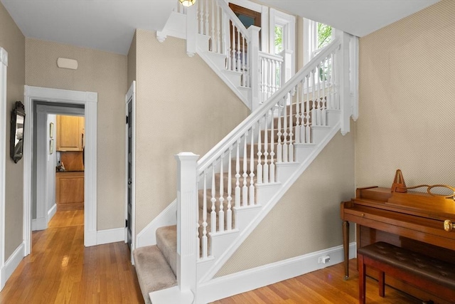 41 Clarke St, Lexington, MA 02421 - staircase featuring wood finished floors and baseboards